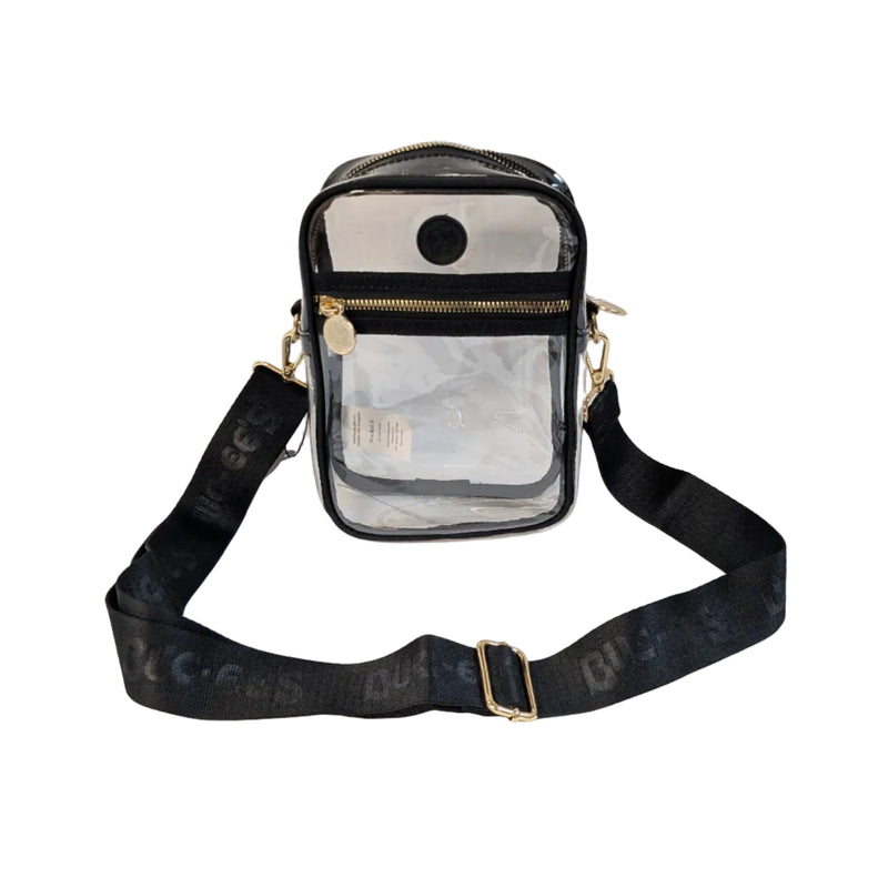 Front view of an 8.5 by 6 inch clear PVC Buc-ee's Clear Crossbody Stadium Bag with black trim, gold zippers, a round Buc-ee's logo patch, and a wide black strap with woven Buc-ee's text.