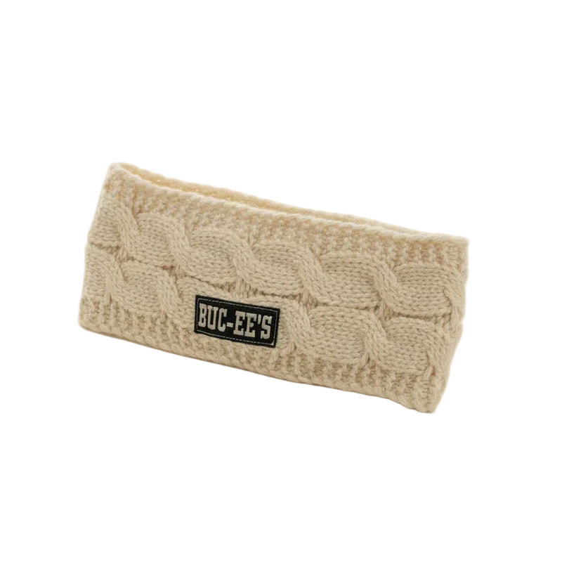Cream cable-knit Buc-ee’s headband laid flat on a white background, featuring a woven Buc-ee’s logo patch on the front.
