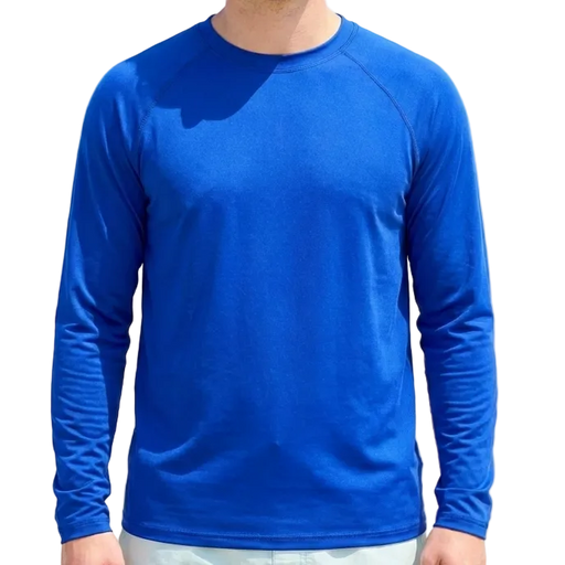 Man wearing a blue long-sleeve shirt on a beach