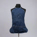 A denim blue Buc-ee's apron featuring an embossed logo with Bucky the Beaver, displayed on a mannequin.