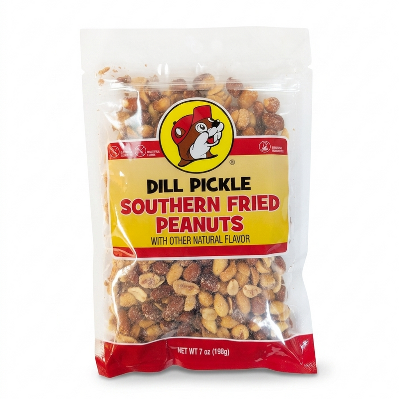 A 7 oz bag of Buc-ee's Dill Pickle Southern Fried Peanuts, displaying a clear view of the seasoned peanuts inside beneath a prominent yellow and red label with the iconic beaver logo.