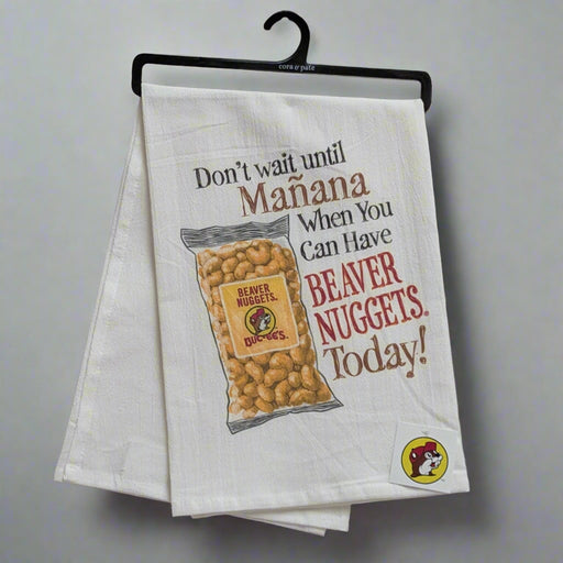 Buc-ee's "Don't Wait Until Manana when you can have Beaver Nuggets today" with beaver nuggets on it. 