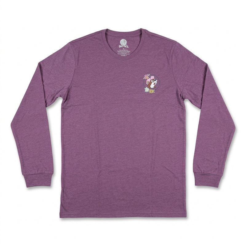 Front view of a heathered purple long-sleeve t-shirt featuring a small left-chest logo of Buc-ee the beaver framed by pastel flowers.