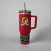 A red Buc-ee's Fit Forty 40oz tumbler with an ergonomic handle, spill-resistant lid, and a straw. It features the Buc-ee's logo and has a label reading 'Yukon' on the lower part.