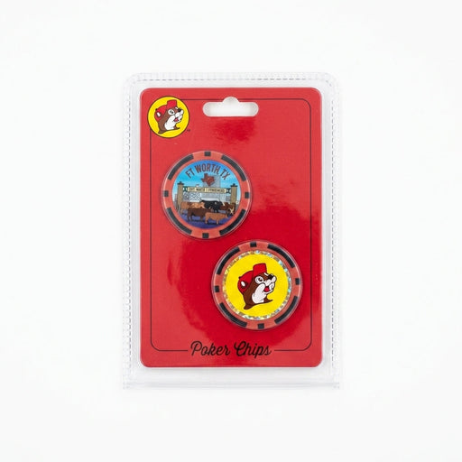 A packaged set of two casino-style poker chips centered on a seamless white background. The top chip features the Fort Worth Stockyards entrance with longhorn cattle, a red Texas shape, and "FT WORTH TX" text. The bottom chip displays the smiling Buc-ee's beaver mascot on a yellow background with a sparkling glitter inner ring and red and black striped edge.