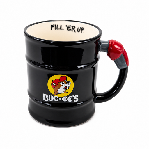 A black ceramic mug styled like an oil barrel featuring the Buc-ee's logo and a custom red gas pump nozzle for a handle. Angle view showing the inside of the black Buc-ee's gas pump mug with the phrase "FILL 'ER UP" printed along the interior white rim.