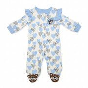 Buc-ee’s girl footed sleeper with blue heart and snow-leopard print, ruffle sleeves, Buc-ee’s logo on chest, and beaver-face footies, displayed on a clean white background.