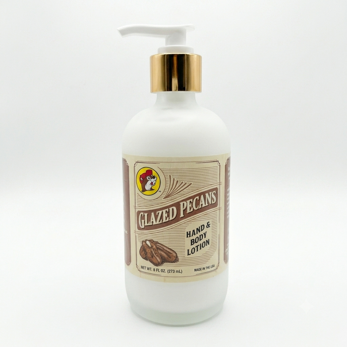 A square product shot of an 8 oz frosted glass pump bottle of Buc-ee's Glazed Pecans Hand & Body Lotion, featuring a gold neck collar and a white pump nozzle pointing to the left, isolated against a seamless, solid white background.