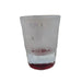 The rear view of the frosted Buc-ee's shot glass against a white background. This view highlights the semi-translucent, satin-frosted texture of the glass, embellished with a repeating pattern of clear, glossy "Buc-ee's" text wrapping around the body. The vibrant, solid red glass bottom is clearly visible at the base.