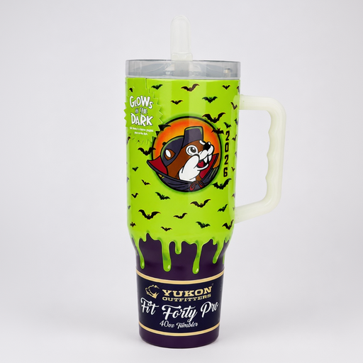 A 32 oz handled tumbler with a clear lid and straw, featuring a Halloween design. The upper half is bright lime green with black bats and a circular dog graphic, with the text 'GOWS DARK' and '2026'.