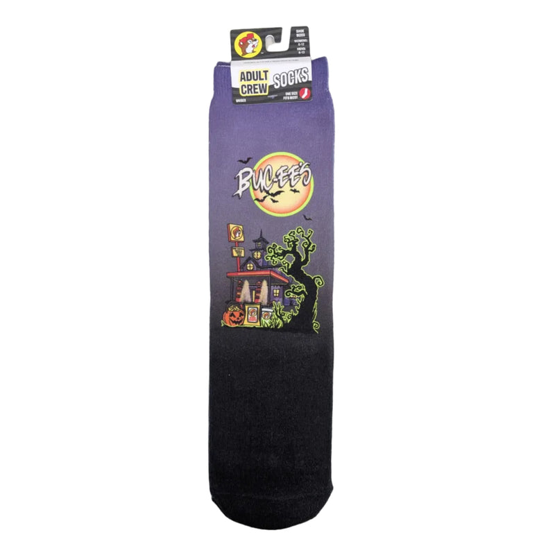 Buc-ee's Halloween crew sock in the Neon Tree style, featuring a purple gradient background with a haunted Buc-ee's store, glowing moon, and green spooky tree.