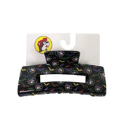 Large black rectangular hair claw clip with a pattern of vampire Buc-ee portraits and colorful flying bats.