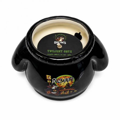 Glossy black ceramic Buc-ee’s Halloween candle with a Twilight Onyx label, cream-colored wax, and a colorful Halloween-themed Buc-ee’s graphic on the front, shown on a clean white background.
