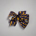 Buc-ee's Halloween Striped Hair Bow. Purple and Orange stripes.