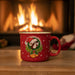 Bring the holiday cheer straight to your coffee table with the Buc-ee’s “Jingle All the Way” Christmas Mug! This festive red mug features cheerful artwork on both sides — one side reads “Jingle All the Way to Buc-ee’s” in bright, holiday-inspired lettering, while the other shows Buc-ee the Beaver wearing a Santa hat surrounded by holly and bells.