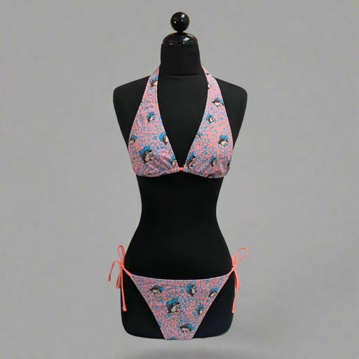 Buc-ee's pink and blue leopard halter bikini set on a dress form