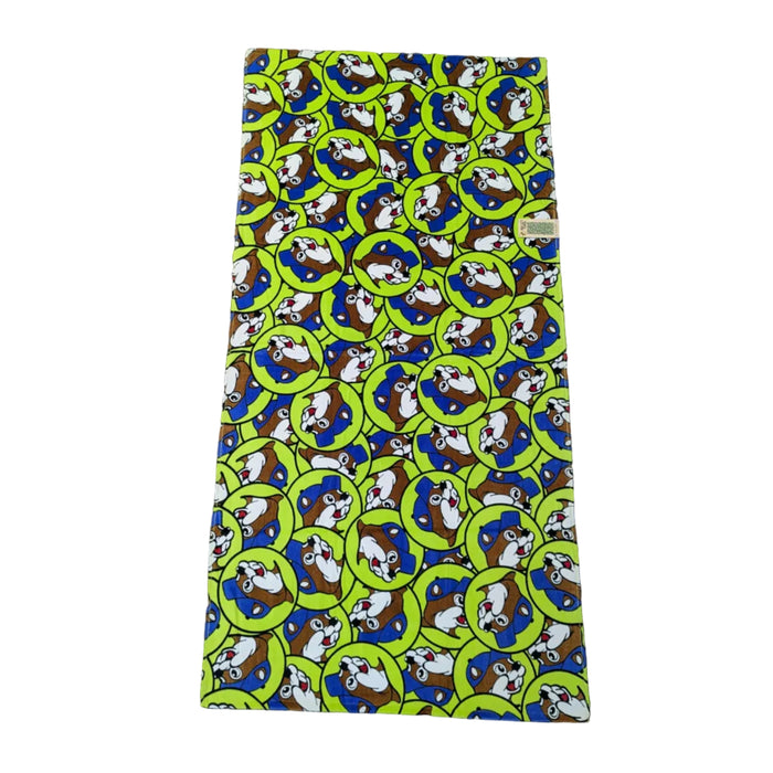 A high-visibility lime green beach towel covered in a repeating pattern of the Buc-ee's beaver mascot wearing a blue hat and a cheerful expression. Displayed on a clean white background.