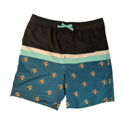 A pair of Buc-ee's colorblock swim shorts featuring a black top, a white and mint green stripe, and a teal blue bottom printed with the iconic beaver mascot. The shorts include an adjustable mint green drawstring. Displayed on a clean white background.