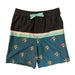 Toddler-sized Buc-ee's Logo Colorblock swim shorts with a black and teal colorblock design and beaver logo pattern. The waistband features a small, fixed mint green decorative bow. Displayed on a clean white background.