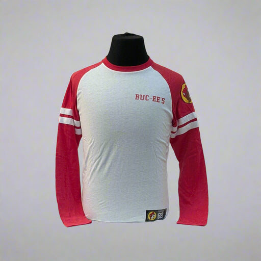 Buc-ee's Long Sleeve Raglan Shirt. Sleeves are red the body is white and it has the logo on the top left sleeve. 