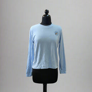 Buc-ee's Lounge Top is a light blue soft top with the logo on the upper left side.