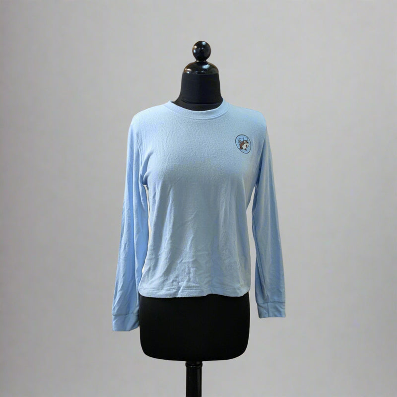 Buc-ee's Lounge Top is a light blue soft top with the logo on the upper left side.