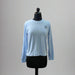 Buc-ee's Lounge Top is a light blue soft top with the logo on the upper left side.