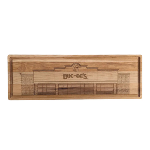 Top-down view of an 18-inch by 6-inch rectangular Buc-ee's Maple Bar Board, a maple wood bar board with a detailed laser engraving of the Buc-ee's storefront. Displayed on a clean white background.