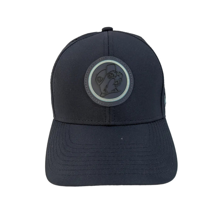 A front-facing view of a structured navy blue performance cap resting on a white background. The center features a circular, dark tonal rubber patch showcasing the Buc-ee's beaver mascot, outlined by a thin mint green ring.