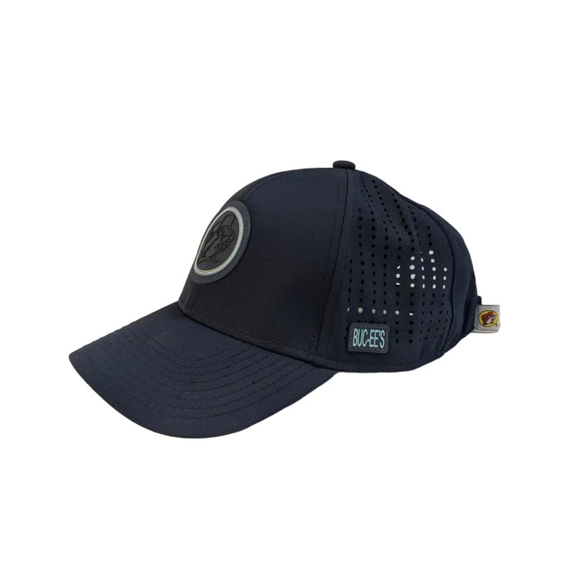 An angled side view of the navy blue performance cap, showcasing the clean curve of the brim and the laser-perforated ventilation holes that cover the side panels for cooling airflow.