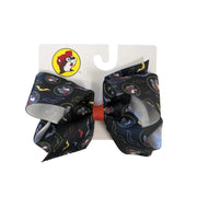 Medium black grosgrain Buc-ee's Halloween hair bow with vampire Buc-ee and bat print, tied with an orange center knot on backing card.