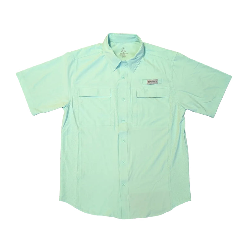 A front view of a solid sea-foam green, short-sleeved performance fishing shirt laid flat on clean white background. The shirt includes a button-down collar, a full button front, and two rectangular chest pockets with hidden flap closures. A grey and white "Buc-ee's" logo patch is sewn above the left chest pocket, and vertical mesh ventilation panels are visible along the sides.