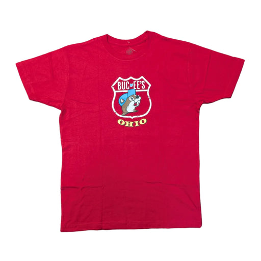 Front view of a Buc-ee's Ohio License Plate Red Shirt, a red short-sleeved t-shirt featuring a central graphic of a white distressed highway shield. Inside the shield is the Buc-ee’s beaver mascot wearing a blue hat, with the word "OHIO" printed in yellow and black underneath. Displayed on a clean white background.