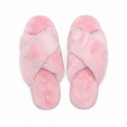 A pair of Buc-ee's pink furry slippers with fluffy faux-fur crisscross straps and matching soft footbeds, displayed side by side on a clean white background.