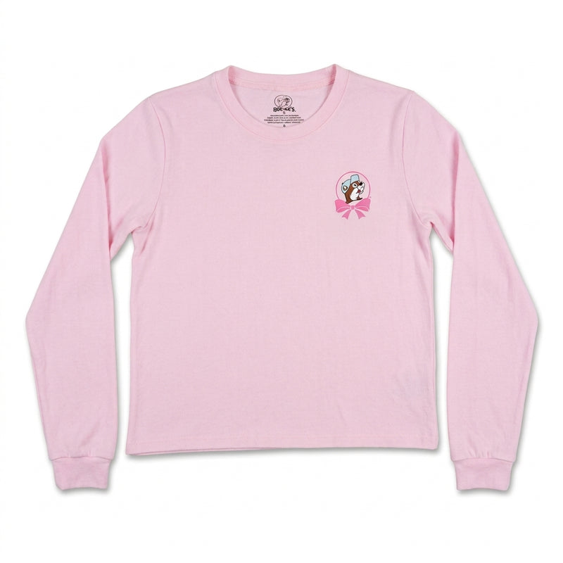 Buc-ee's adult light pink long sleeve lounge shirt laid flat featuring the Buc-ee's beaver logo in a pink bow graphic on the chest.