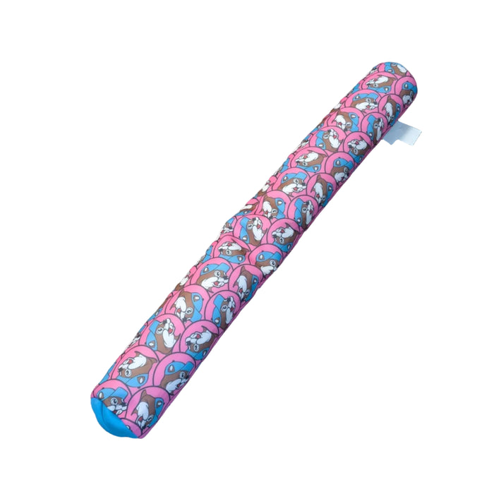 A bright pink, bean-filled Buc-ee's premium pool noodle displayed on a white background. The quick-drying fabric is decorated with a repeating pattern of the Buc-ee's beaver mascot wearing a blue cap.