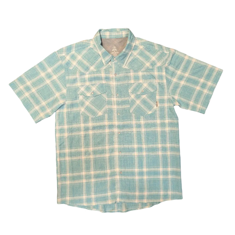 A front view of a short-sleeved, turquoise and white plaid western-style fishing shirt laid flat on a clean white background. The shirt features a pointed collar, a pearl-snap button front, and two slanted chest pockets with snap-down flaps. A small "Buc-ee's" logo tab is visible on the edge of the left pocket.