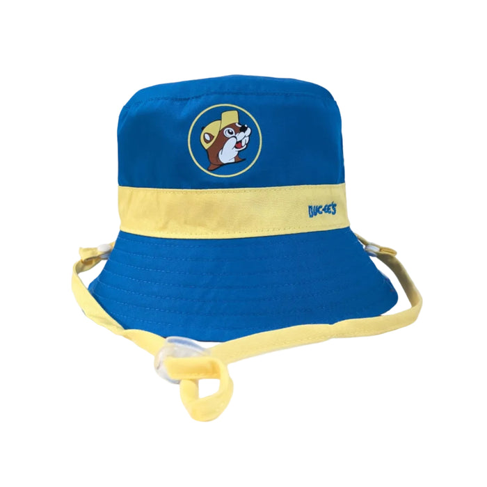 The reverse side of the red bucket hat, featuring a royal blue crown and brim with a yellow contrast band. The beaver in the central logo wears a yellow hat, and the yellow band features "BUC-EE'S" embroidered in blue. The yellow chin strap remains attached for security.