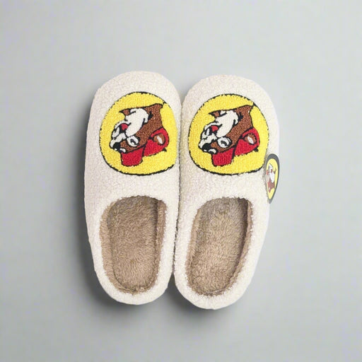 Buc-ee's Sherpa Logo Slippers. White sherpa texture with the Buc-ee's logo on the top.