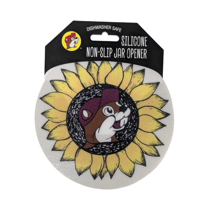 A round Buc-ee's silicone non-slip jar opener styled as a large yellow sunflower, with the Buc-ee beaver logo nestled into the dark center of the flower. Displayed on a clean white background.