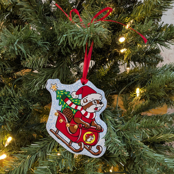This Buc-ee’s Sleigh Ornament features everyone’s favorite beaver dressed as Santa, cruising in his sleigh with a Christmas tree in tow. Bright, festive colors and a sturdy design make it perfect for spreading Texas-sized joy all season long