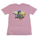 A pastel pink short-sleeve crew neck t-shirt laid flat against a white background. The shirt features a large graphic on the front showing the outline of the state of South Carolina. Inside the state shape is a retro beach sunset with a lighthouse, palm trees, and yellow flowers. Superimposed over the map is the text "Buc-ee's South Carolina" beneath a circular logo of the Buc-ee's beaver mascot wearing a teal baseball cap.
