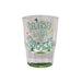 The back of a clear shot glass featuring the text "IRISH I WERE AT BUC-EE'S" in stylized green and white letters, decorated with small green and orange shamrocks, displayed on a clean white background.