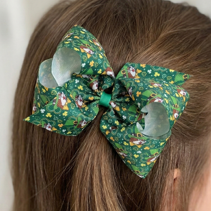 Green floral hair bow on a person's head with a neutral background