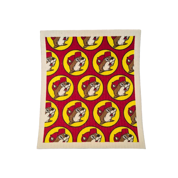 A square Swedish dishcloth featuring a repeating pattern of the classic Buc-ee's logo—the beaver mascot wearing a red hat inside a yellow circle—set against a solid red background.
