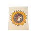 A square Swedish dishcloth on a cream background, featuring a large, brightly colored yellow and orange sunflower. The center of the sunflower displays the head of the Buc-ee's beaver mascot.