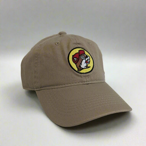 A brown baseball cap with the 'Buc-ee's' logo in white script on the front.