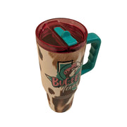 A top-down view of the translucent pink plastic lid on the tumbler. The lid features a central teal accents piece and a teal flip-up straw mechanism, which is currently folded flat and integrated into the top surface of the lid.