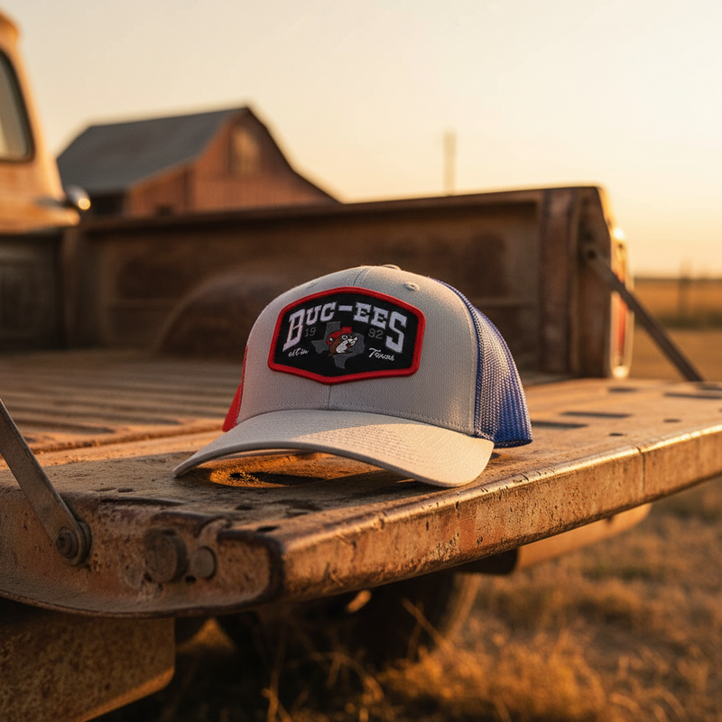 A snapback hat with the Texas flag colors and a 'Buc-ee's' logo on the front.
