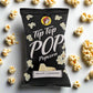 Buc-ee's Tip Top Popcorn White Cheddar flavor in a black bag. 